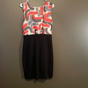 Dress ready to wear to an evening function!  Fitted and classy look.